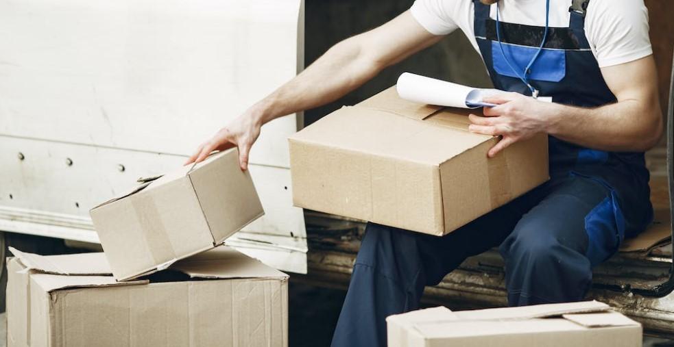 How this has led to a decline in the number of postal worker jobs.