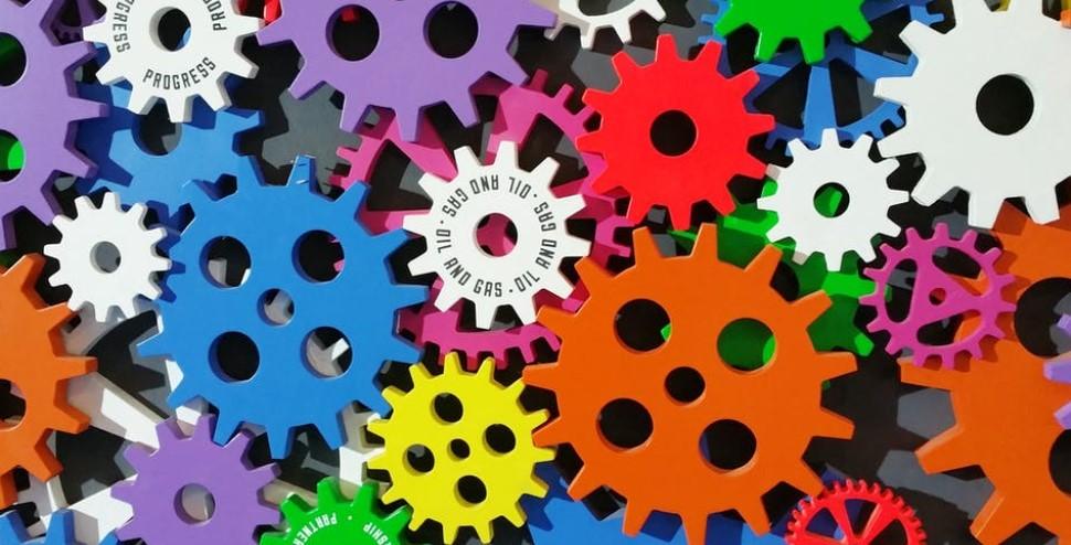 How automation and technological advancements have led to more machines and robots doing the work.